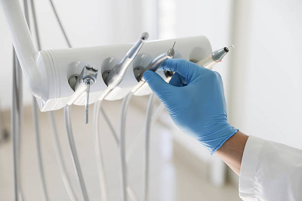Professional Tooth Extraction technician working in Danville, IL